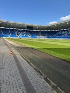 Aanleg kunstgras voetbalveld door rolugro