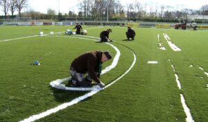 een kunstgras veld laten aanleggen door Rolugro